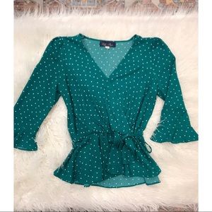Green polka dot blouse